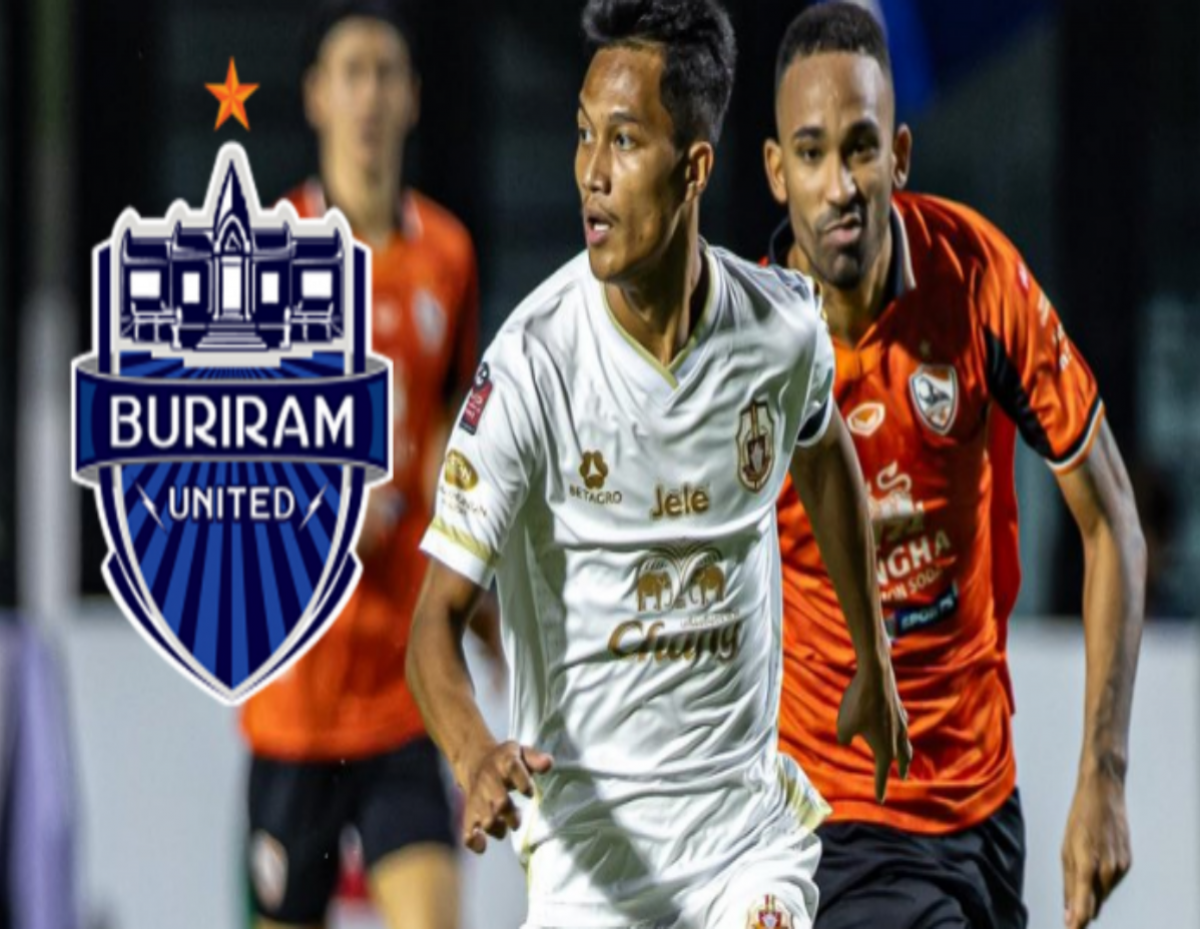 Soccer action scene with two players chasing the ball, Buriram United crest on the left side of the image