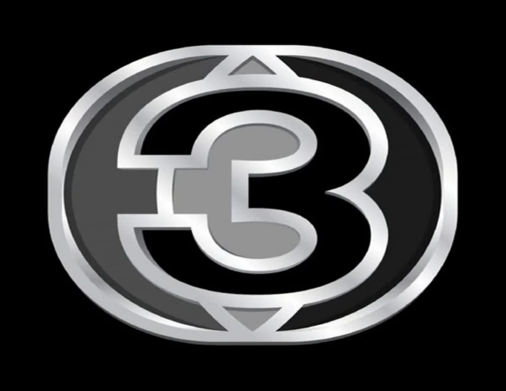Metallic circular logo with a stylized 'E3' centerpiece on a black background.